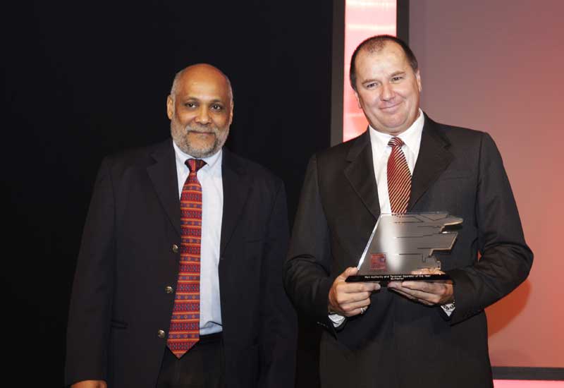 Gulftainer's Peter Richards (on right) receiving the award. 